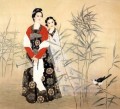 Chinese maiden in reed field and bird